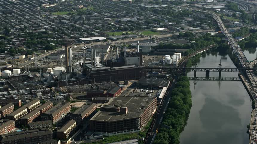 Aerial view of Veolia Energy power plant next to the Schuylkill River in Philadelphia during a partly cloudy day