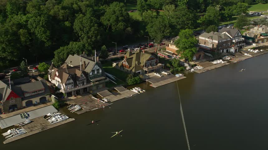 Aerial footage captures rowers on the Schuylkill River by Boathouse Row in Philadelphia Pennsylvania