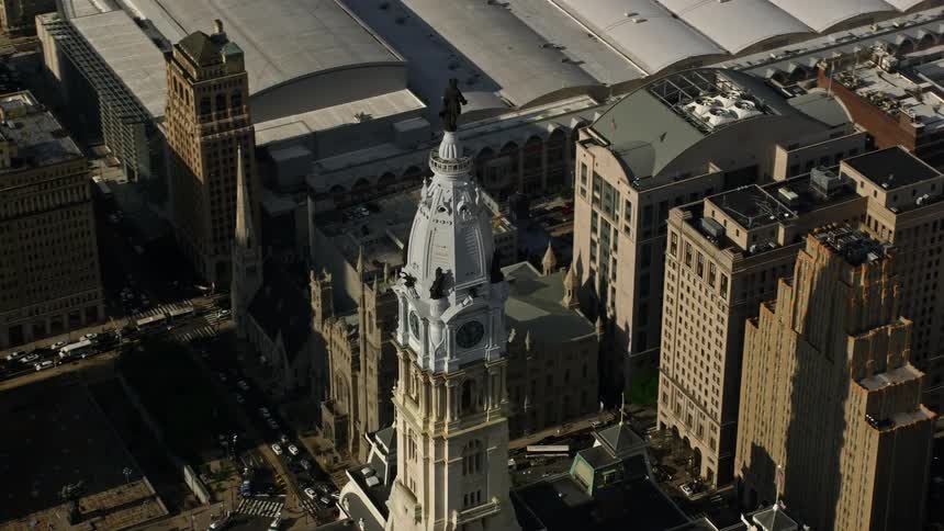The William Penn statue atop Philadelphia City Hall is shown in an aerial view of the sunny metropolis