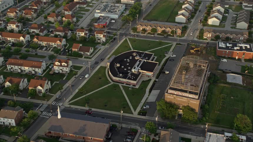 A beautiful aerial shot of a community center and church in North Philadelphia during sunset