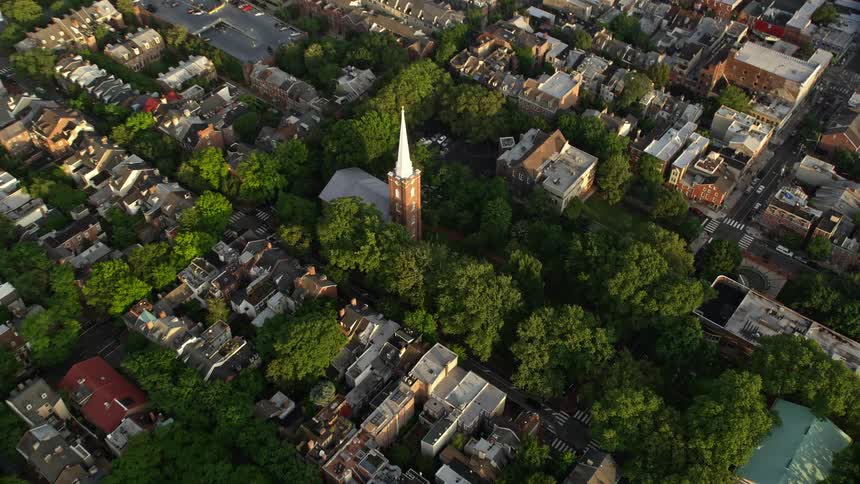 Approaching St Peters Episcopal Church in an urban neighborhood during sunset in Philadelphia Pennsylvania