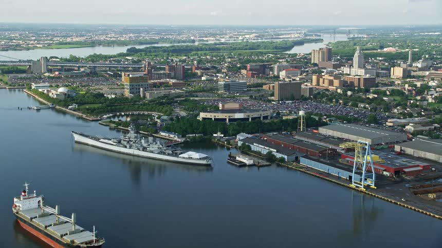 Approaching the USS New Jersey on the Delaware River with BB&T Pavilion and Balzano Marine Terminal visible in Camden New Jersey