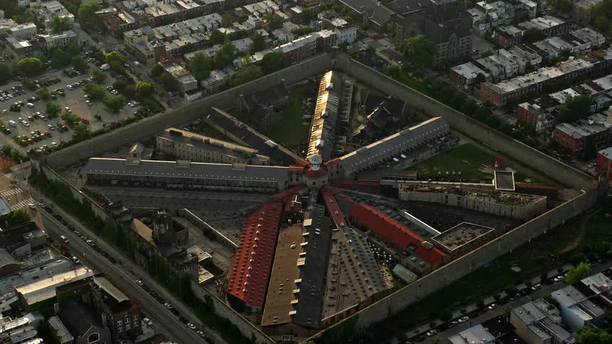 A breathtaking aerial view at dusk of the historical Eastern State Penitentiary a government landmark in Philadelphia Pennsylvania