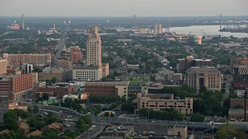 A stunning aerial view of Camden County City Hall and US District Court at dusk showcasing the government buildings and the hazy sunset over the Northeasts Camden New Jersey