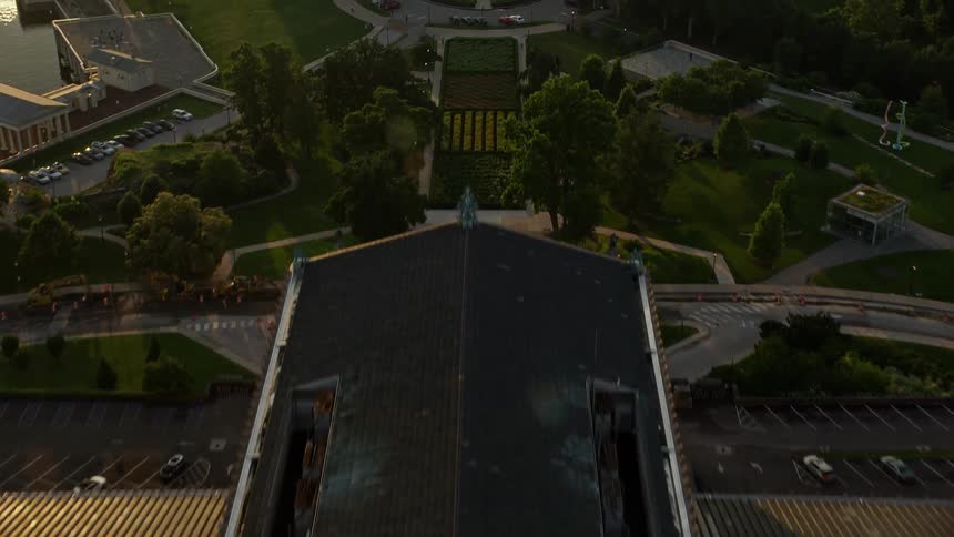 Approaching the fountain at The Oval park and Philadelphia Museum of Art during a hazy sunset in Pennsylvania