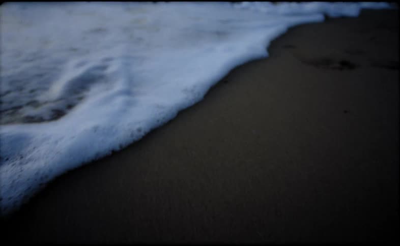 Ocean waves are moving towards the beach coast