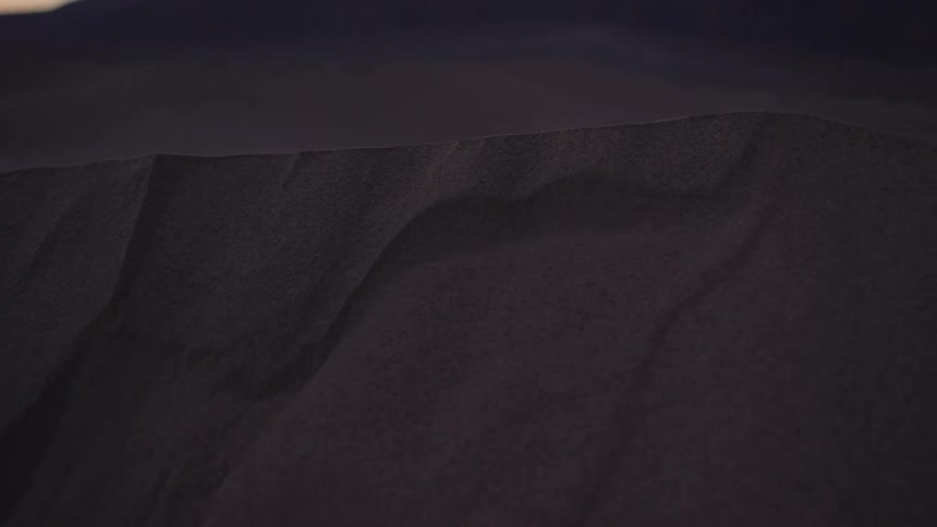 Sand moves on a hill