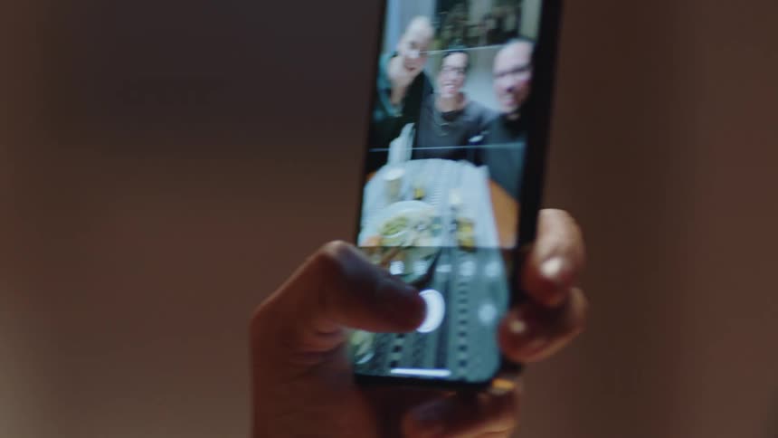 Someone is taking a picture of some friends in the day time