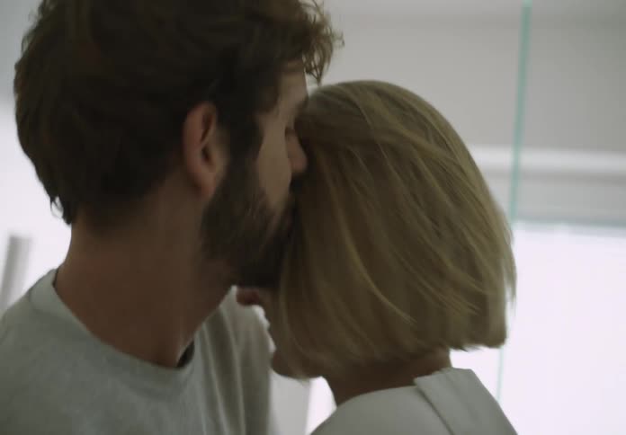 Man and woman are showing affection to each other
