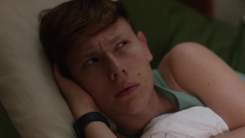 A teenager slowly wakes up