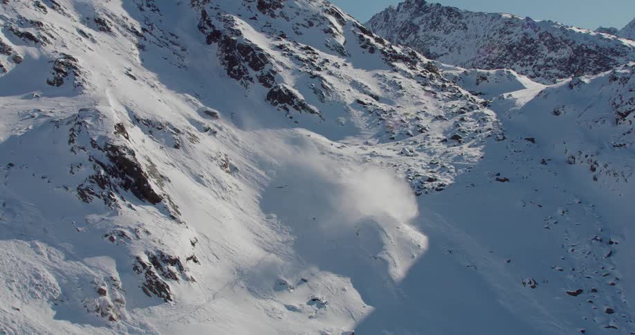 The natural beauty of a snowy hill in winter the footage provides a panoramic view of the landscape with the snowcovered hill taking center stage the tranquil surroundings and pristine snow make this video a calming and relaxing watch