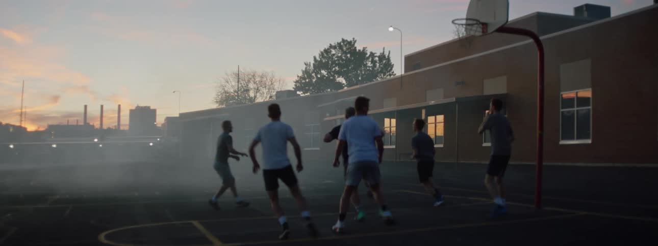 A group are playing a basketball game