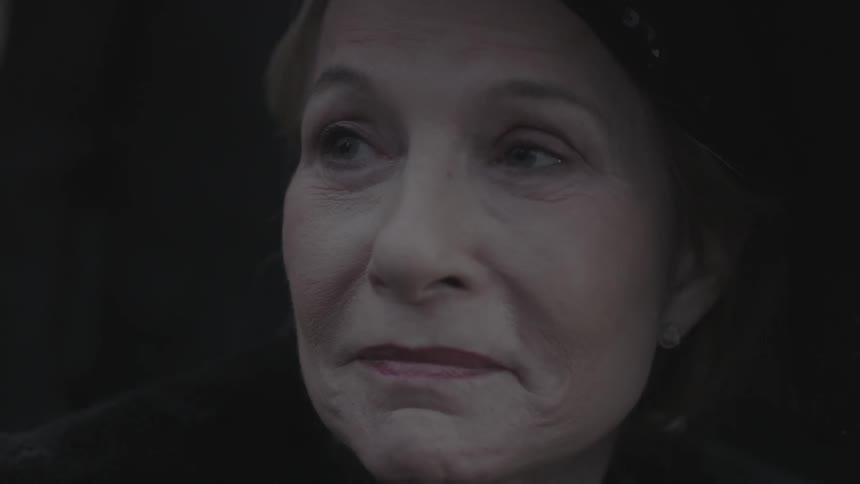 A woman frowns