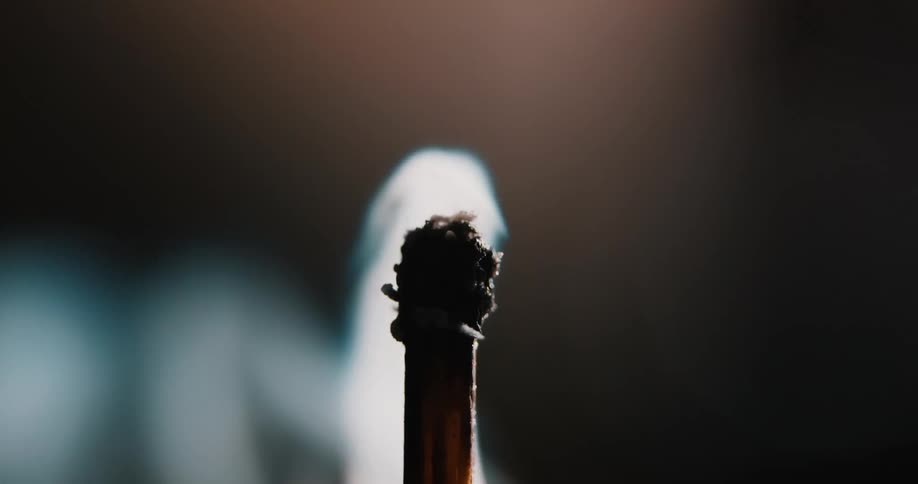 A matchstick ignites and immediately goes out