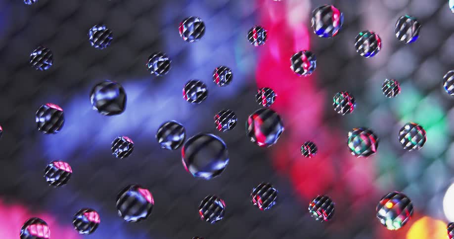 Water droplets form on the outside of a window