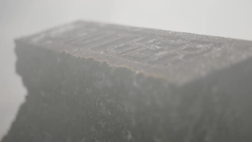 Grave marker in the mist
