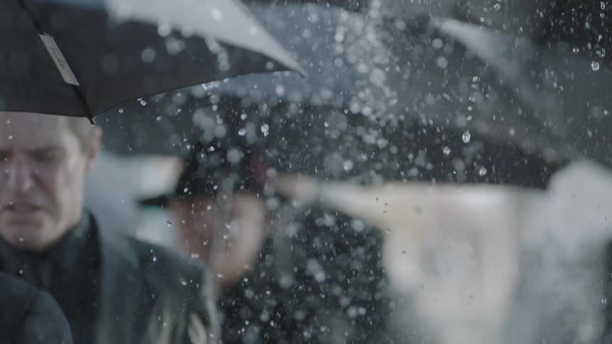 People walking in the rain