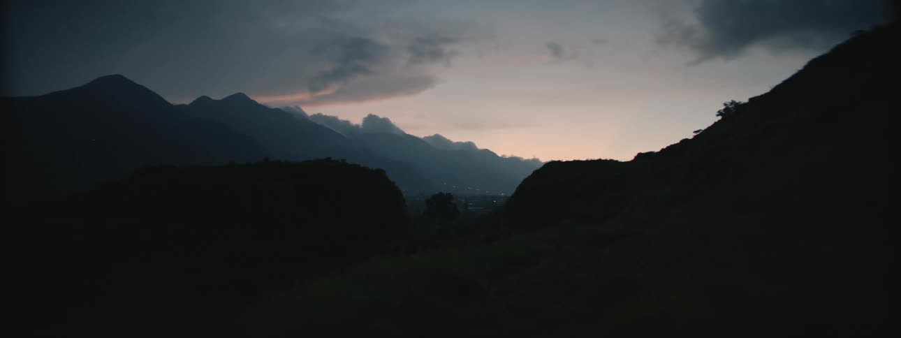 Twilight Town Lights amidst Dark Himalaya Mountains