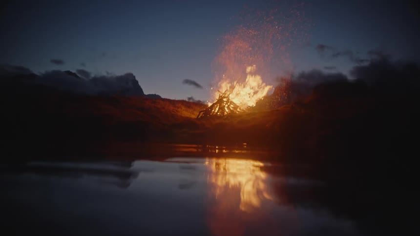 Coastal Blaze: Camera Dives Under and Soars Over Fiery Scene