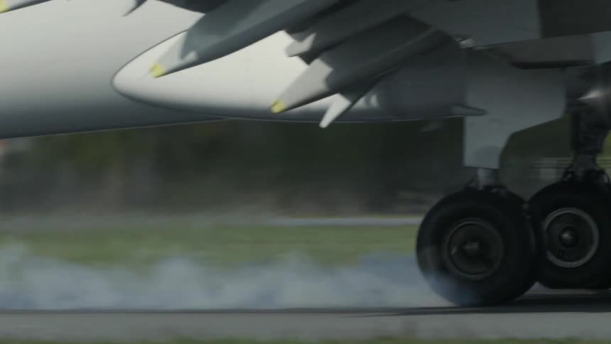 A small plane takes off from an airfield