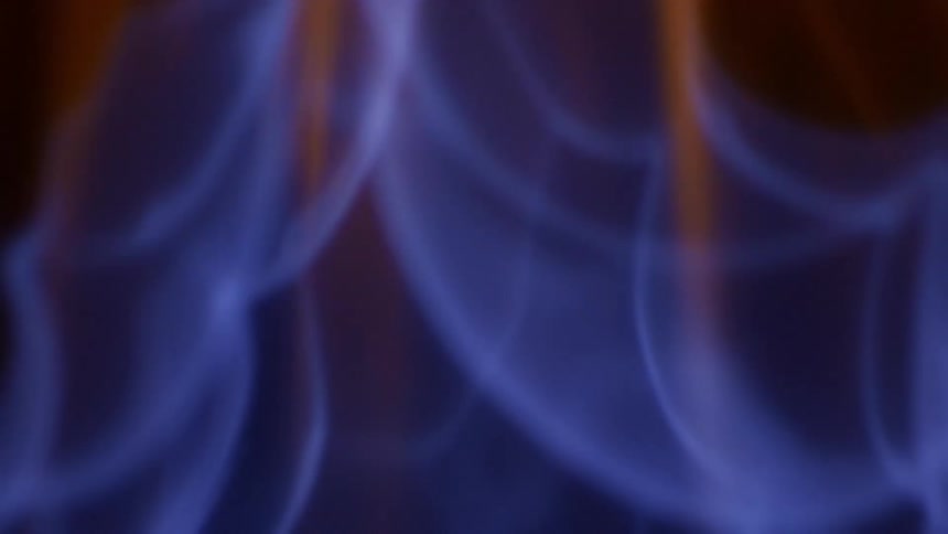 Close up view of a fire with flames and smoke
