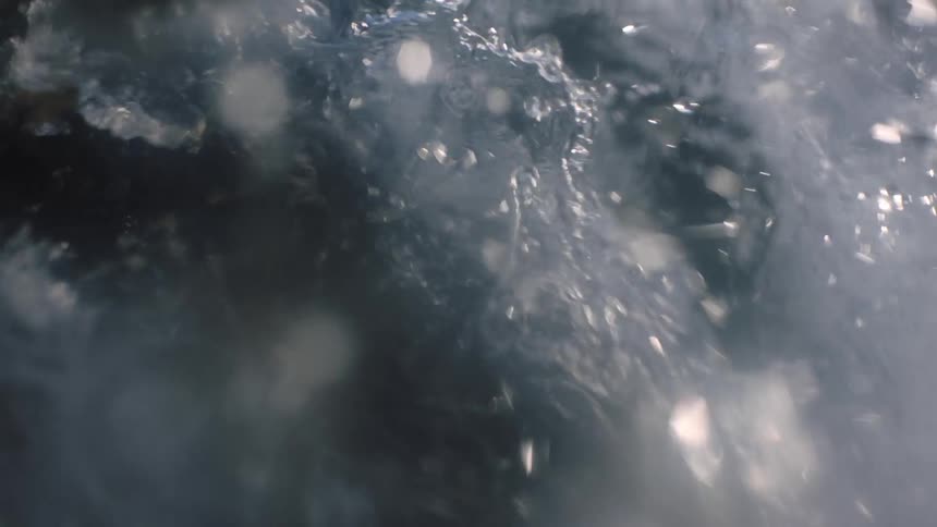 Rushing River Stream: Dynamic Waterfall Cascading Against Wall