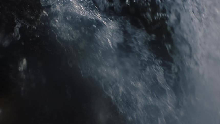 Majestic Cascade: Powerful Waterfall Crashing Down