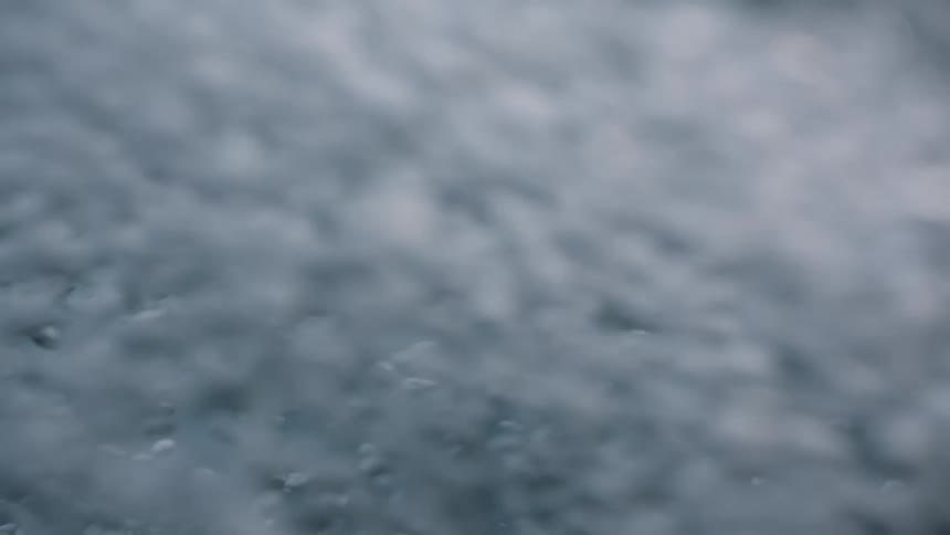 Immersive Waterfall Experience: Close-Up Bubble Over Camera