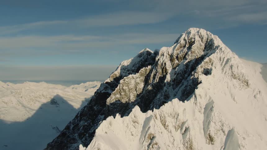 Morning Majesty: Aerial View of Snow-Covered Switzerland Alps