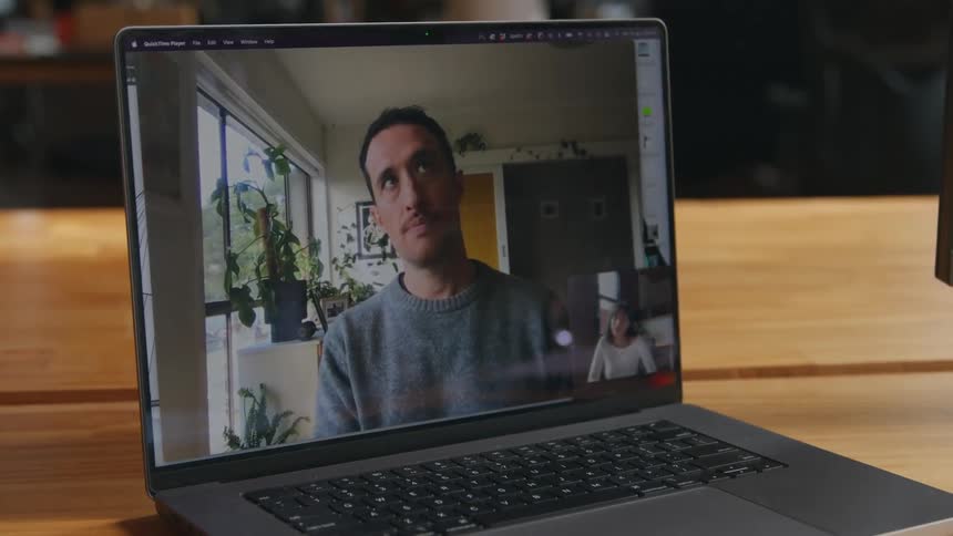 A man and woman on video chat on a laptop with the man in the main screen