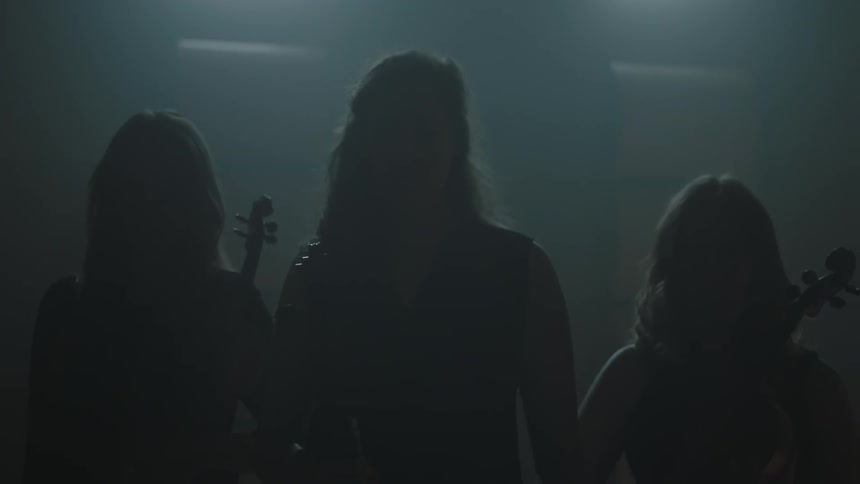 Women are standing in the dark