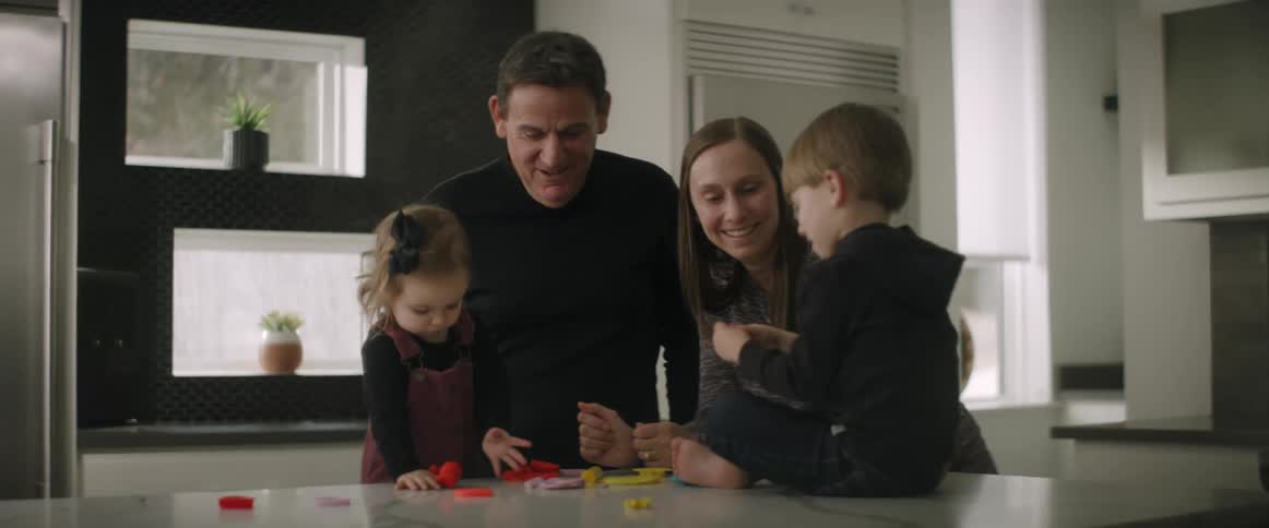 A family play with blocks together