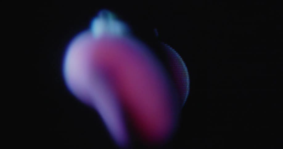 Macro shot of a spinning xmas ornament being transformed on flickering retro computer screen