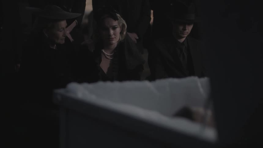 A group of people at a funeral