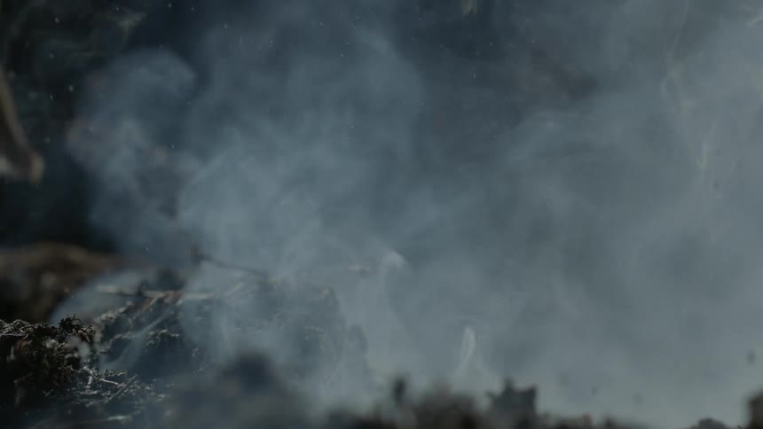 Small dirt explosion in the smoky aftermath