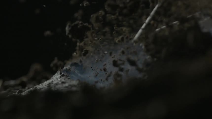 The dirt explodes flying around