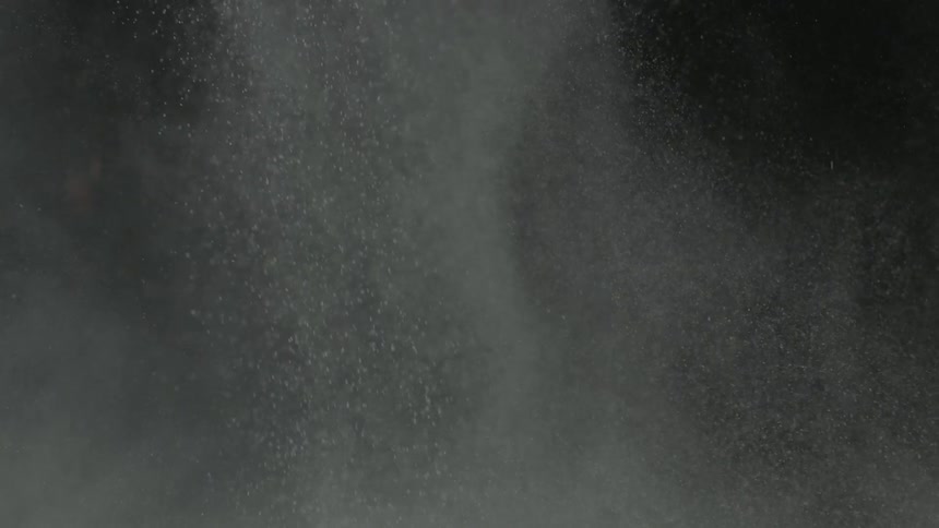 An explosion sends liquid flying