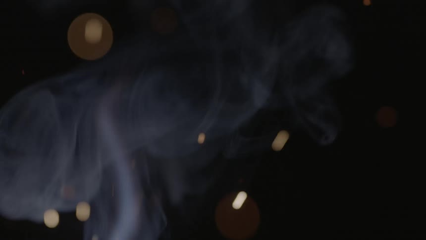 Smoke rises from a fire