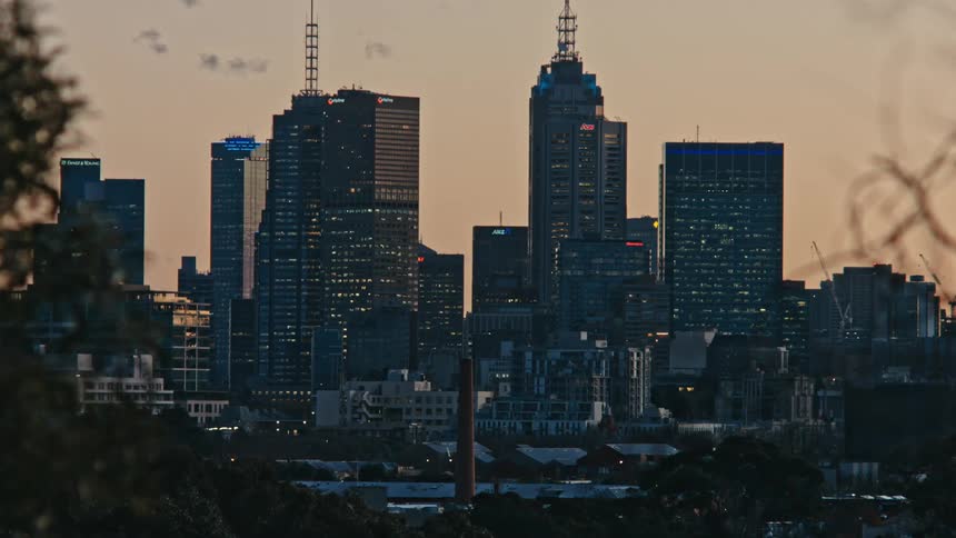 A city skyline with tall buildings and sky scrapers