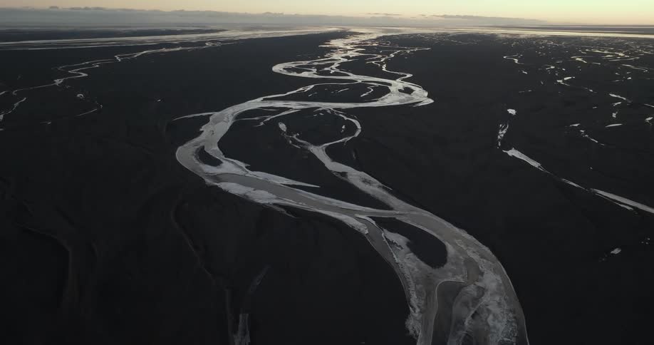 Aerial view of a river while the sun is setting