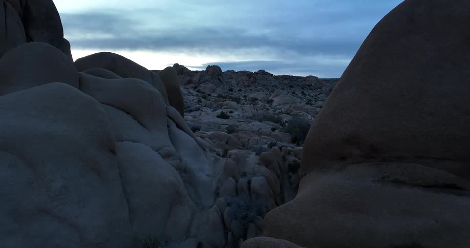 Rocks and boulders on a canyon in the desert at evening