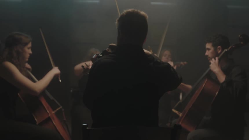 A group of string musicians playing