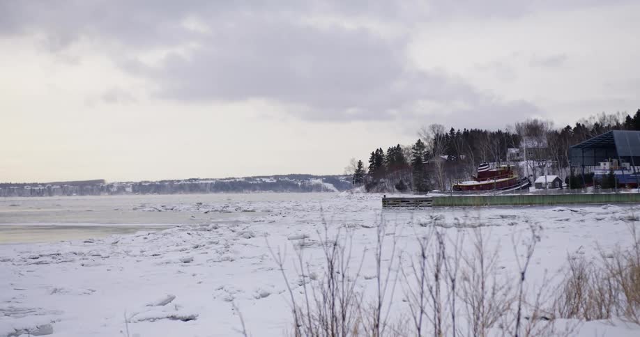 A blanket of snow covers a rural neighborhood