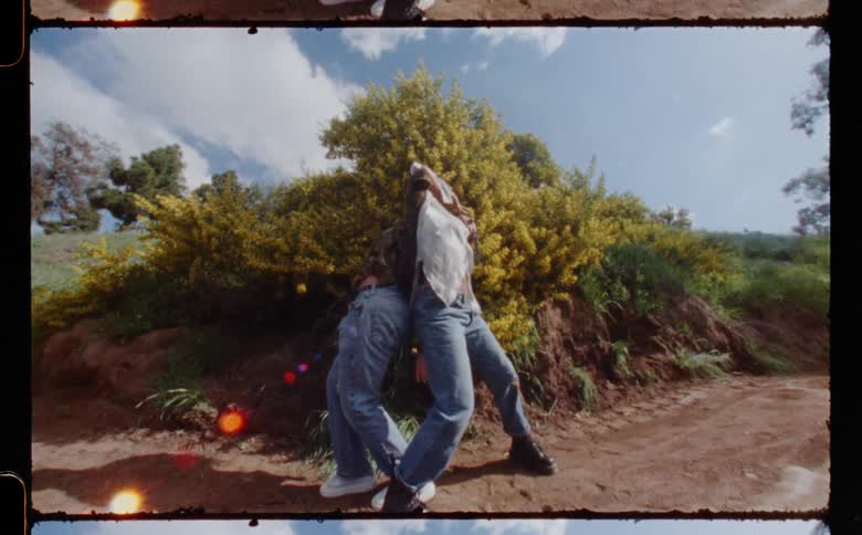 Two women are dancing together