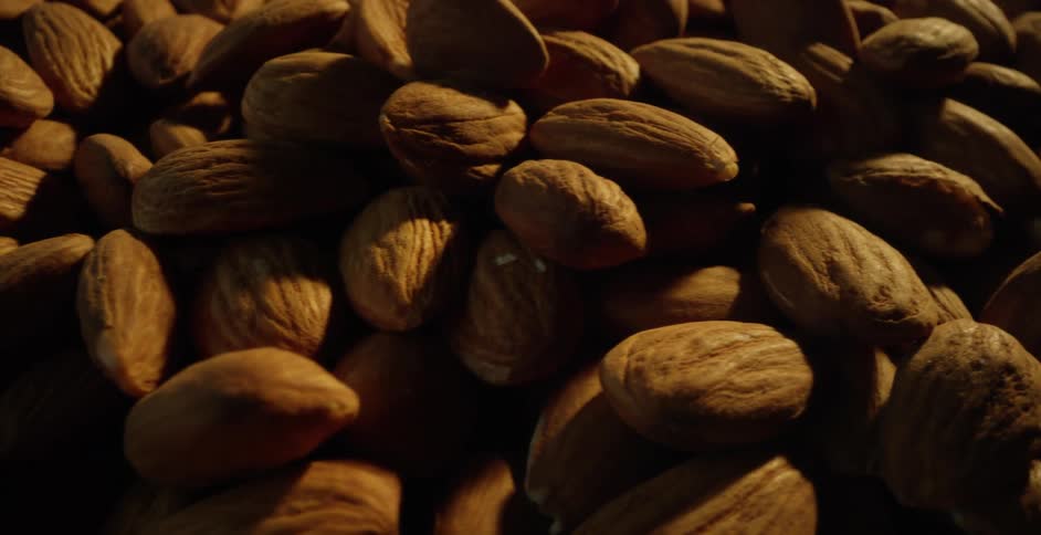 Pile of almonds on a burlap sack