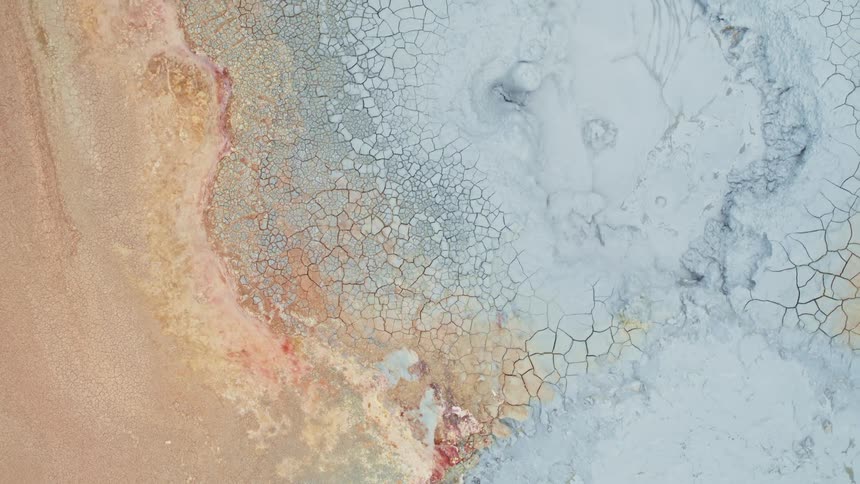 Birds eye view of geysers erupting is displayed
