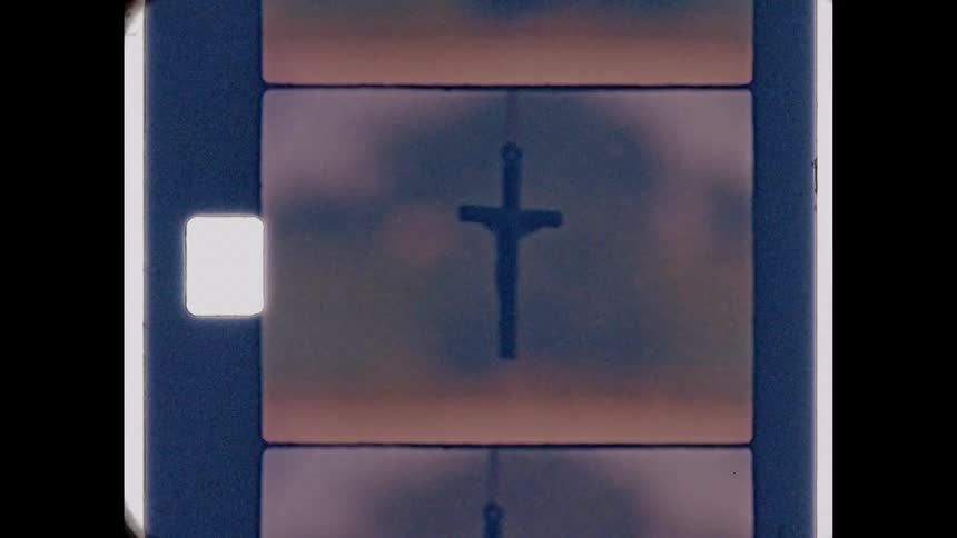 Crucifix necklace hanging in car