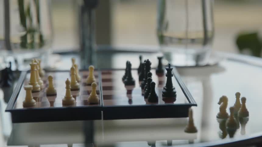 A chess board game is sitting on a table