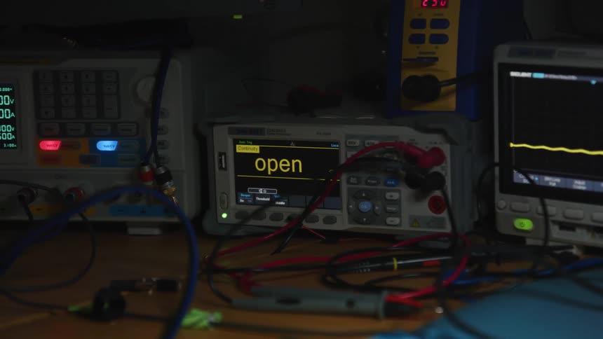Oscilloscope anddigit digital multimeter with cords