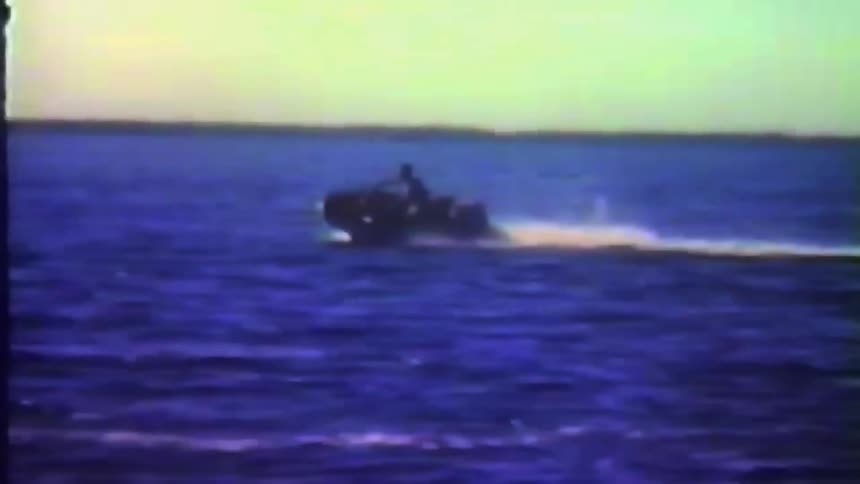 A man riding a jet ski in the ocean